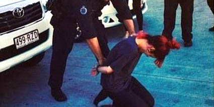 Lily Allen in handcuffs