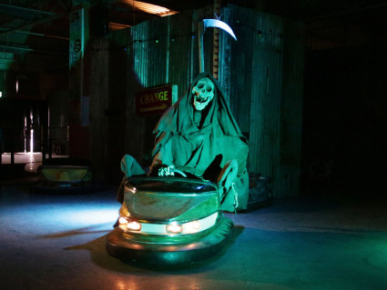 Grim reaper on bumper cars at Banksy's Dismaland theme park. Yui Mok / PA WIRE